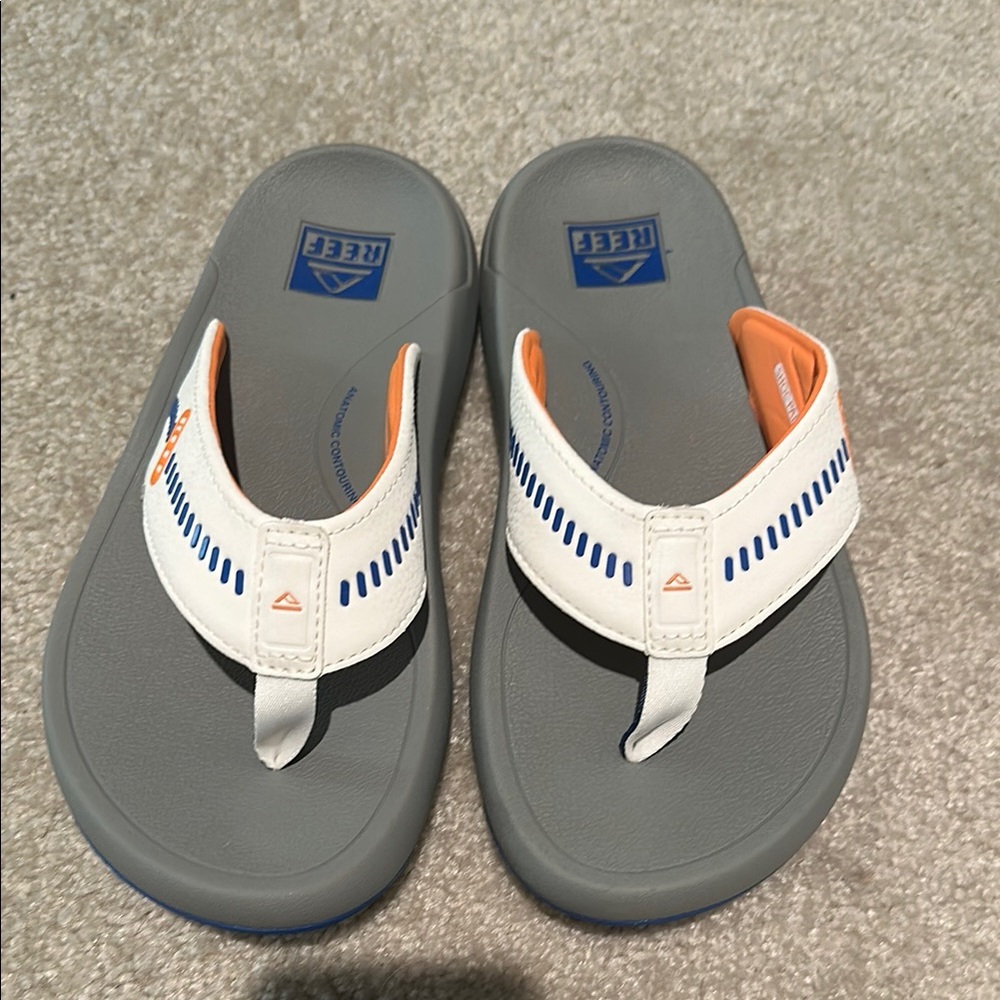 Reef Men’s Gray and White Flip-Flops with Orange Accents